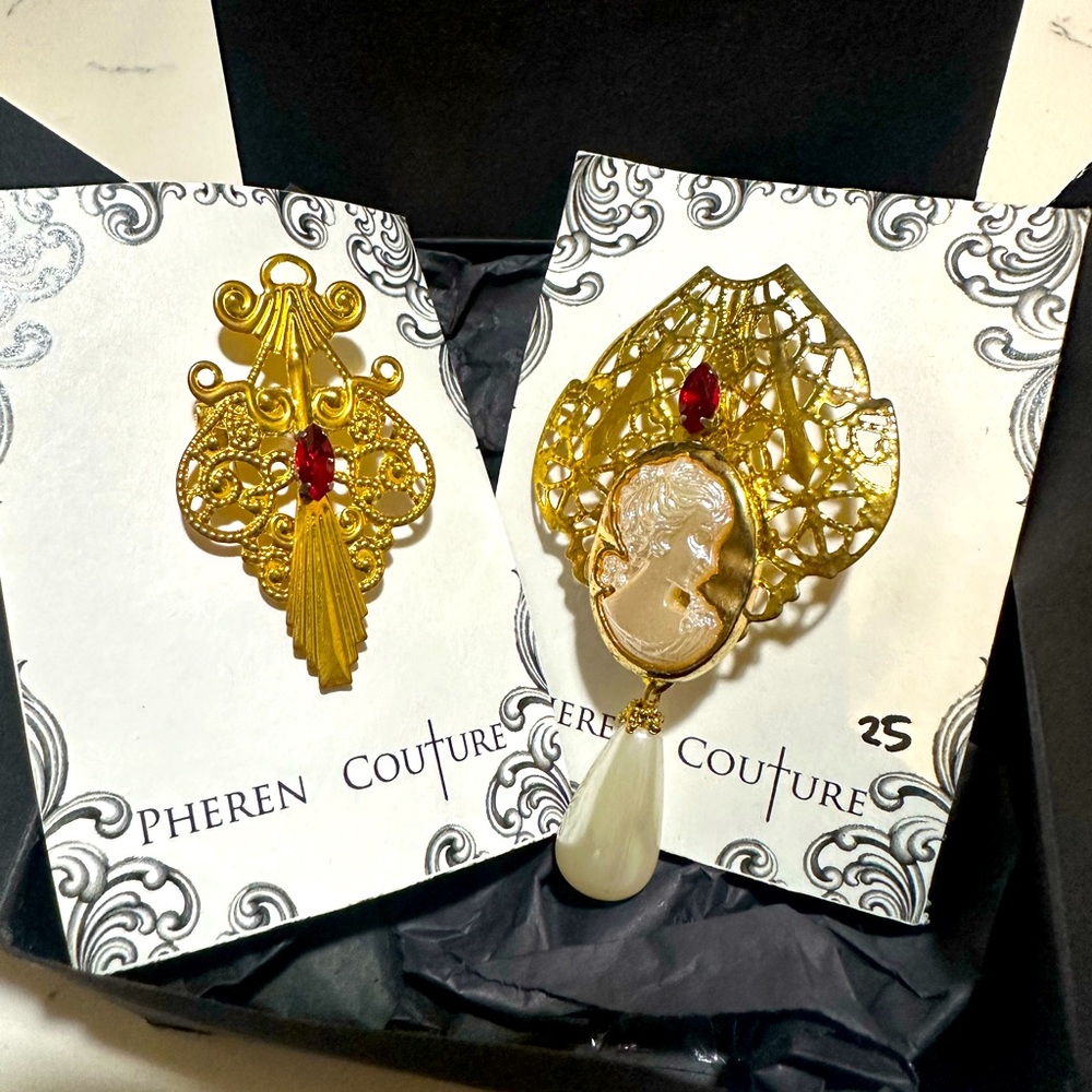 Gold brooches by Pheren Couture